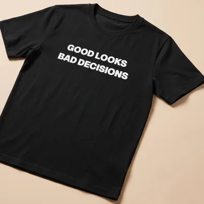 Funny t-shirt with bold lettering saying Good Looks, Bad Decisions