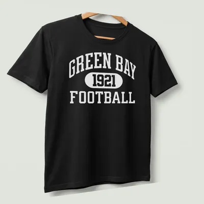 Vintage style shirt with Green Bay Football 1921 text in classic font — printed on a unisex t-shirt (angled view)