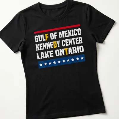 Distressed vintage design featuring Gulf of Mexico, Kennedy Center, Lake Ontario text in red, white, blue, and yellow — printed on a women's shirt