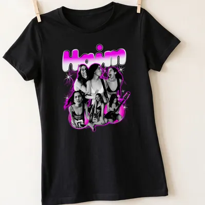 Retro Haim band shirt with bold pink text and playful design — printed on a women's shirt