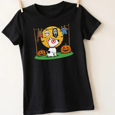 Cartoon dog hanging with Halloween costumes on a line in bright colors — printed on a women's shirt