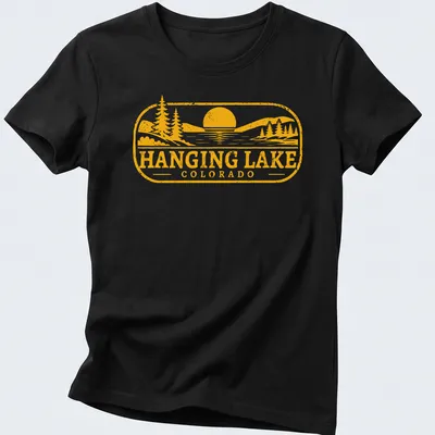 Vintage T-shirt featuring Hanging Lake, Colorado in yellow and white on black — printed on a women's shirt