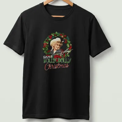 Festive illustration of Dolly Parton with the text Have a HOLLY DOLLY Christmas in green, red, white, and gold