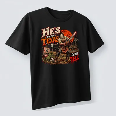 Horror illustration featuring a chainsaw-wielding character with dark lettering — printed on a unisex t-shirt (angled view)