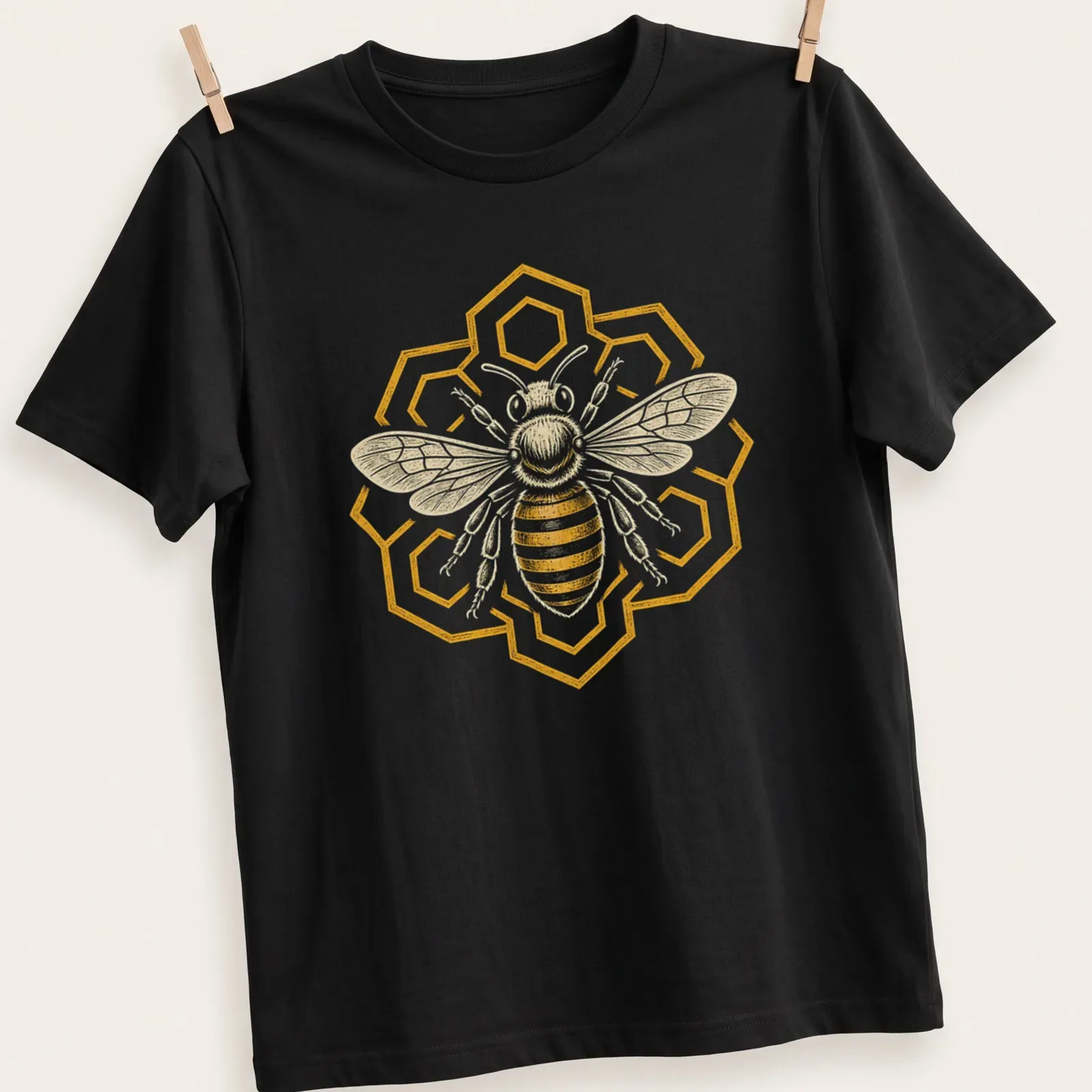 Heraldic honeybee graphic with geometric patterns in gold, black, and white — printed on a unisex t-shirt