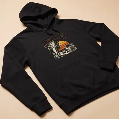 Vintage climbing t-shirt featuring a rock climber and Hueco Tanks State Park text — printed on a unisex hoodie