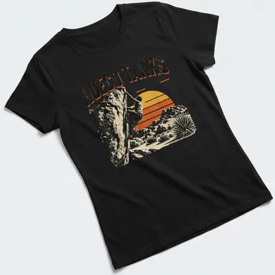 Vintage climbing t-shirt featuring a rock climber and Hueco Tanks State Park text — printed on a women's shirt