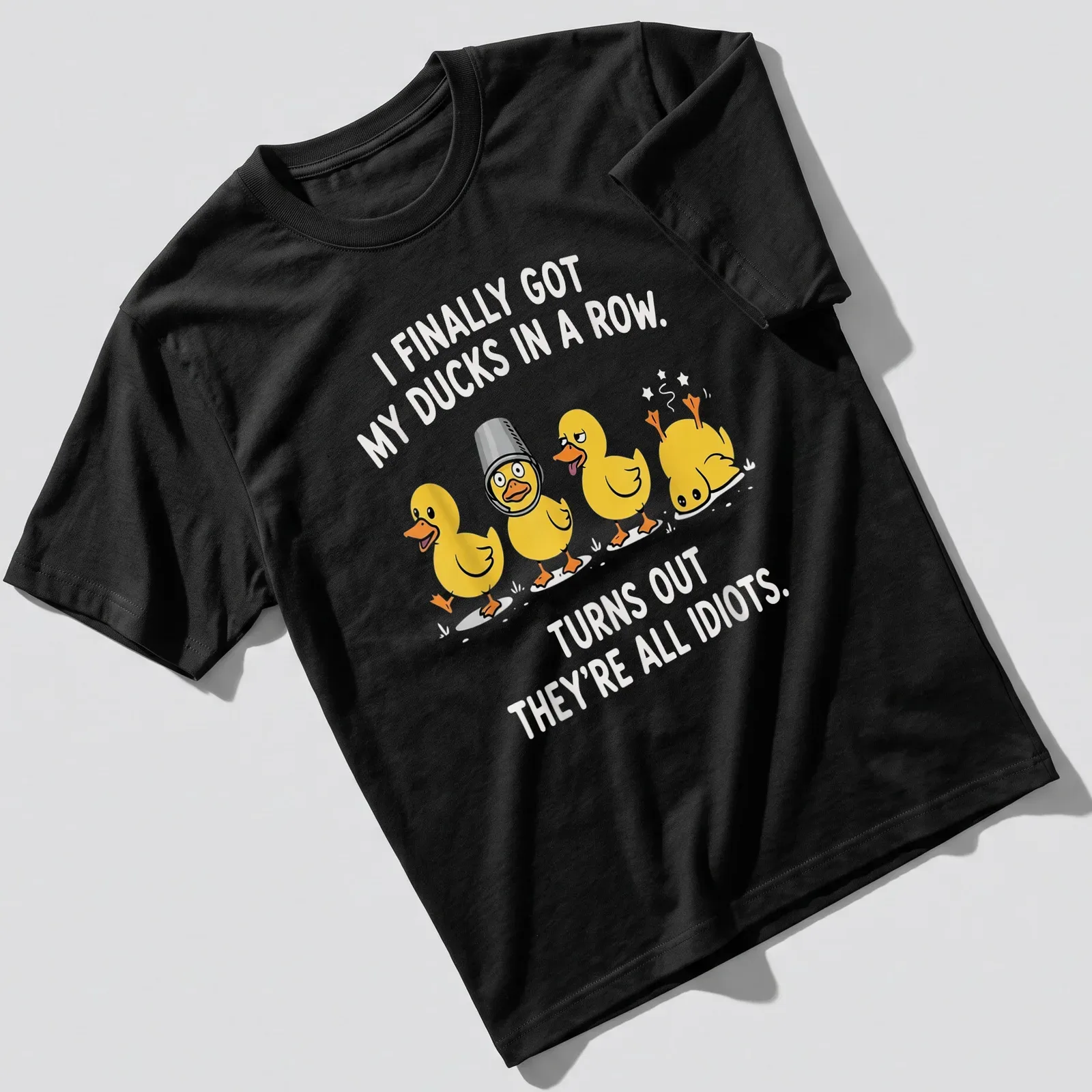 Playful cartoon ducks with humorous text about disorganization on a — printed on a unisex t-shirt