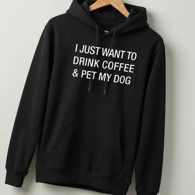 Bold typography shirt stating I Just Want To Drink Coffee & Pet My Dog — printed on a unisex hoodie