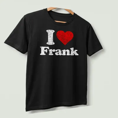 Distressed graphic tee featuring a red heart and text 'I Love Frank' in white — printed on a unisex t-shirt (angled view)
