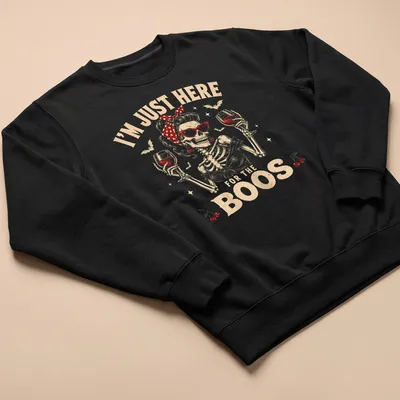 Vintage retro t-shirt featuring a skeleton holding wine glasses with Halloween-themed text — printed on a unisex sweatshirt