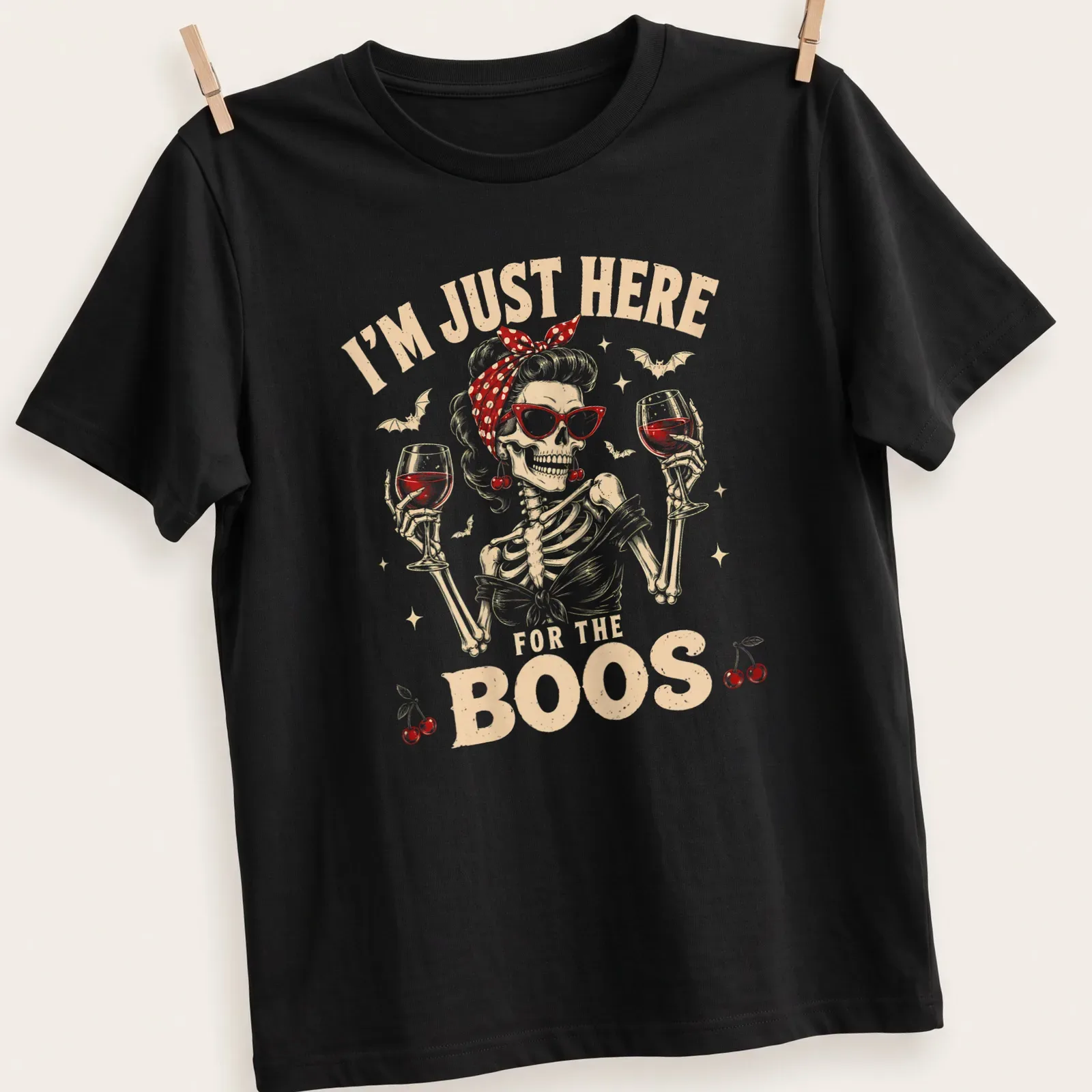 Vintage retro t-shirt featuring a skeleton holding wine glasses with Halloween-themed text — printed on a unisex t-shirt