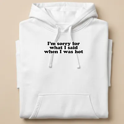 Funny t-shirt with humorous quote about saying sorry when hot — printed on a unisex hoodie