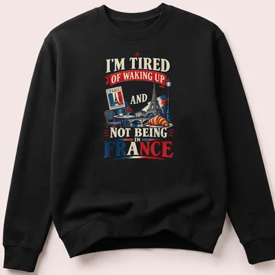 Vintage retro Paris design with text about waking up in France — printed on a unisex sweatshirt
