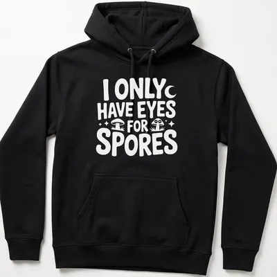 Playful illustration of mushrooms with the text I Only Have Eyes For Spores — printed on a unisex hoodie