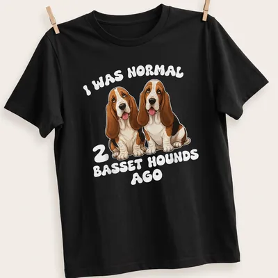Cartoon style t-shirt featuring humorous text and two Basset Hounds