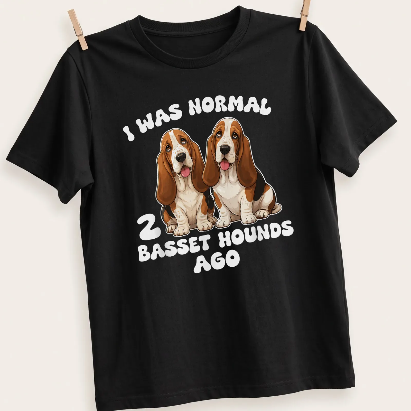 Cartoon style t-shirt featuring humorous text and two Basset Hounds — printed on a unisex t-shirt