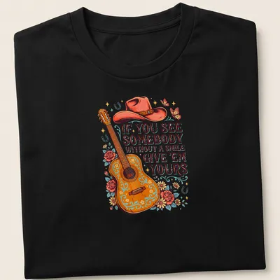 Vintage floral tee with an inspiring message and acoustic guitar graphic