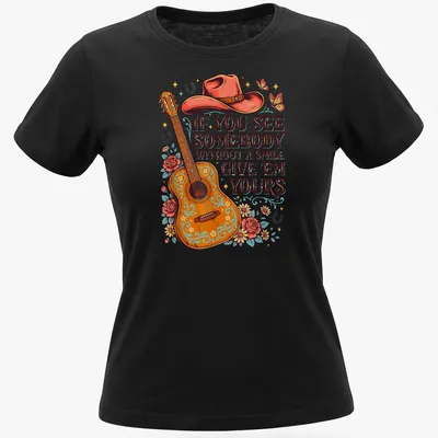 Vintage floral tee with an inspiring message and acoustic guitar graphic — printed on a women's shirt