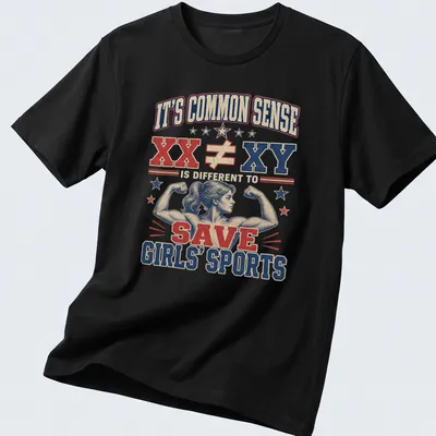 Vintage distressed shirt with strong woman graphic and bold text about girls' sports