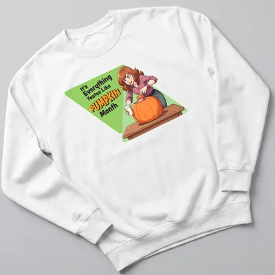 Cartoon woman holding a pumpkin with text: It's Everything Tastes Like PUMPKIN Month — printed on a unisex sweatshirt