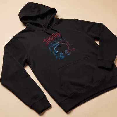 Grunge style print of a raccoon named Jimothy crawling out of a storm drain — printed on a unisex hoodie