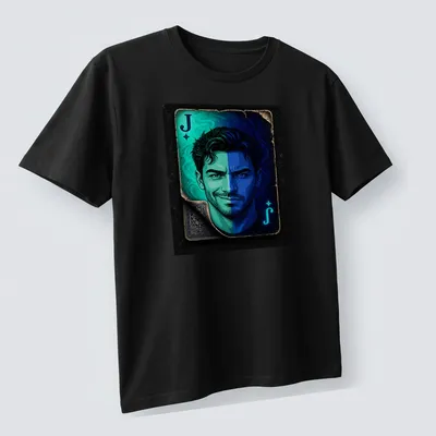 Vibrant illustration of the Joker playing card face featuring the letter J — printed on a unisex t-shirt (angled view)