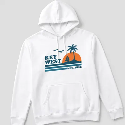 Vintage retro Key West T-shirt with sailboat and palm tree graphic — printed on a unisex hoodie