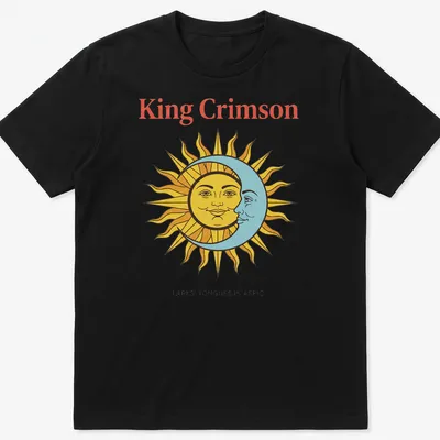 Vintage T-shirt featuring King Crimson artwork with sun and moon faces in bold colors.