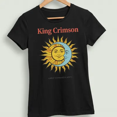 Vintage T-shirt featuring King Crimson artwork with sun and moon faces in bold colors. — printed on a women's shirt