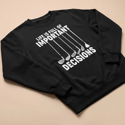 Golf T-shirt with line art of golf clubs and humorous text about decisions — printed on a unisex sweatshirt
