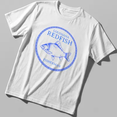 Vintage illustration of a redfish with bold text above it on a fisherman t-shirt