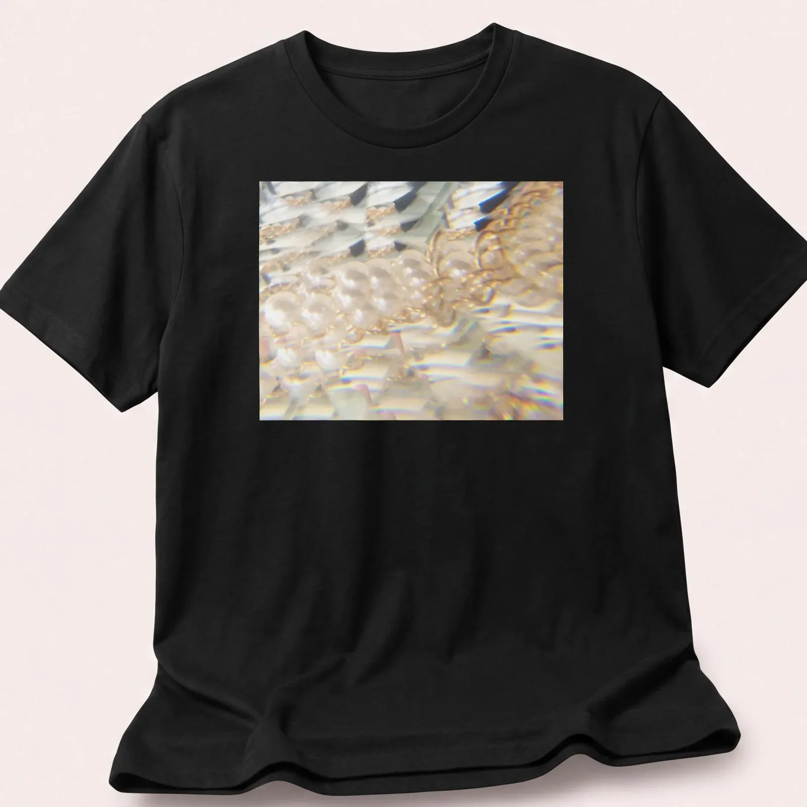 Iridescent jellyfish illustration in a prism effect with white, gold, and blue hues — printed on a unisex t-shirt