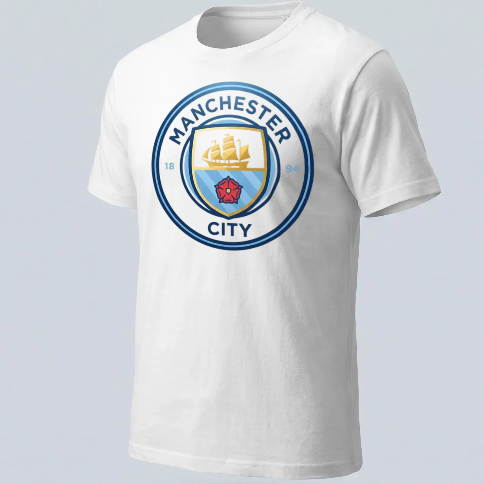 Manchester City crest t-shirt with emblem design in blue, gold, red, and white — printed on a unisex t-shirt