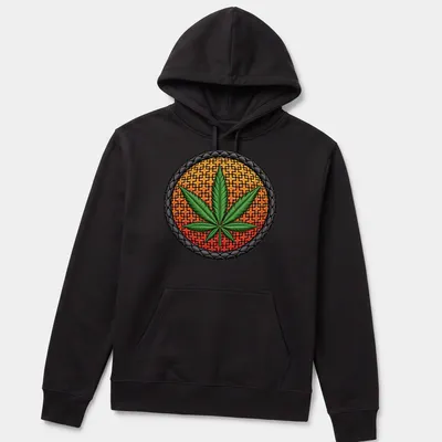 Embroidered patch of a marijuana leaf in green, orange, black, and yellow. — printed on a unisex hoodie