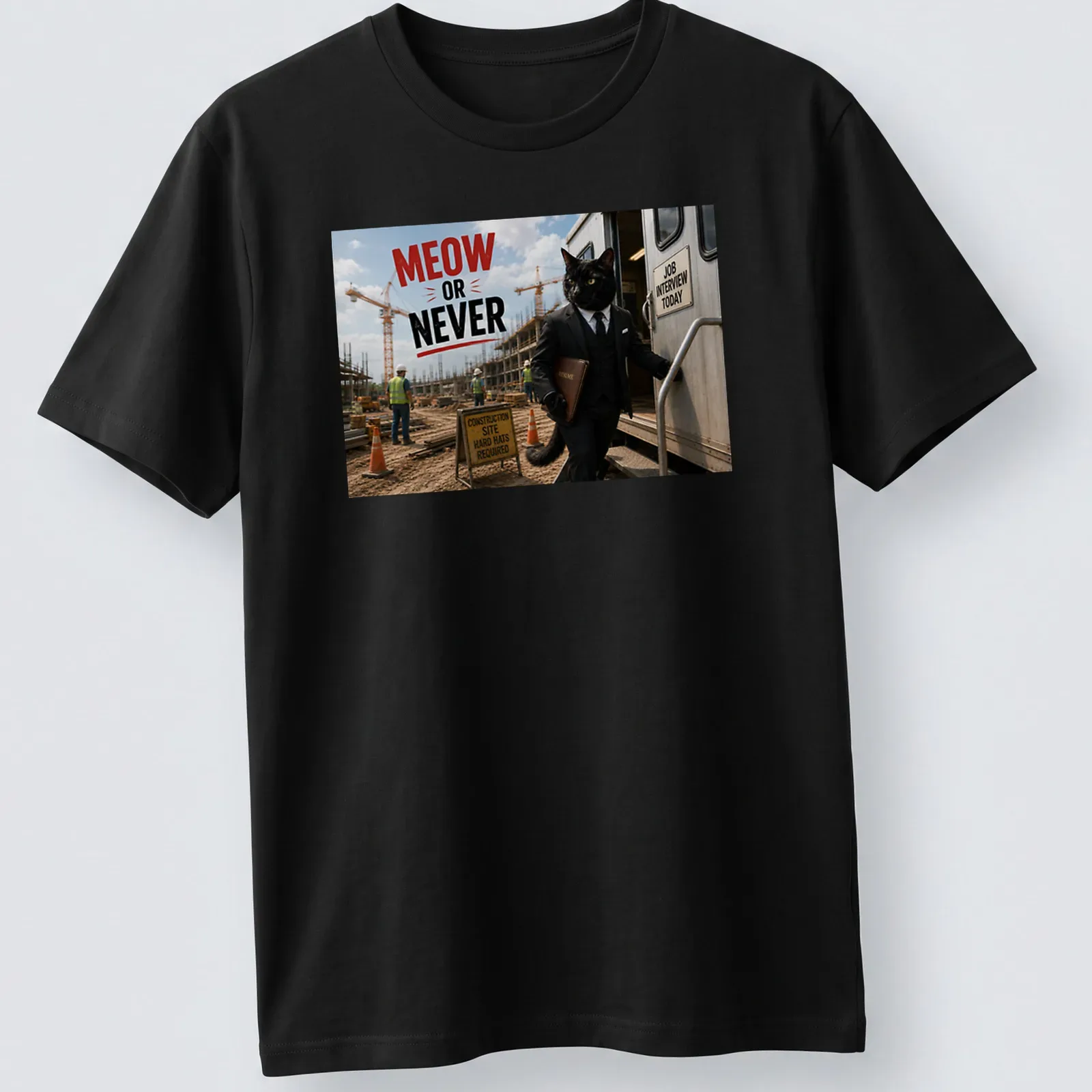 Humorous cat in a suit with the text 'MEOW OR NEVER' — printed on a unisex t-shirt