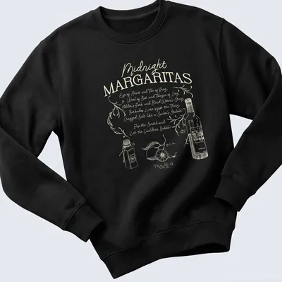 Whimsical vintage design featuring margaritas and playful Halloween-themed text — printed on a unisex sweatshirt