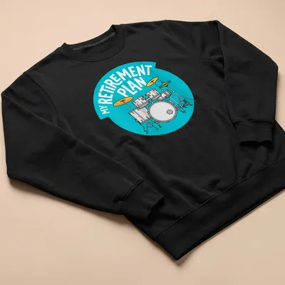 Cartoon style t-shirt featuring a drum set and humorous text about retirement plans — printed on a unisex sweatshirt