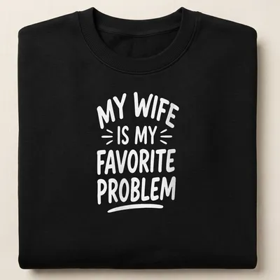 White text graphic reading 'My Wife Is My Favorite Problem' on — printed on a unisex sweatshirt