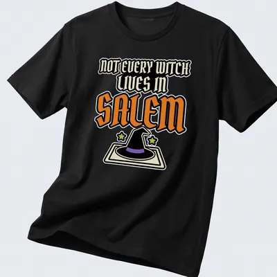 Bold Halloween quote t-shirt featuring a witch hat and stars in vibrant colors.