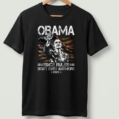 Vintage distressed shirt with humorous political text and a person raising a hand
