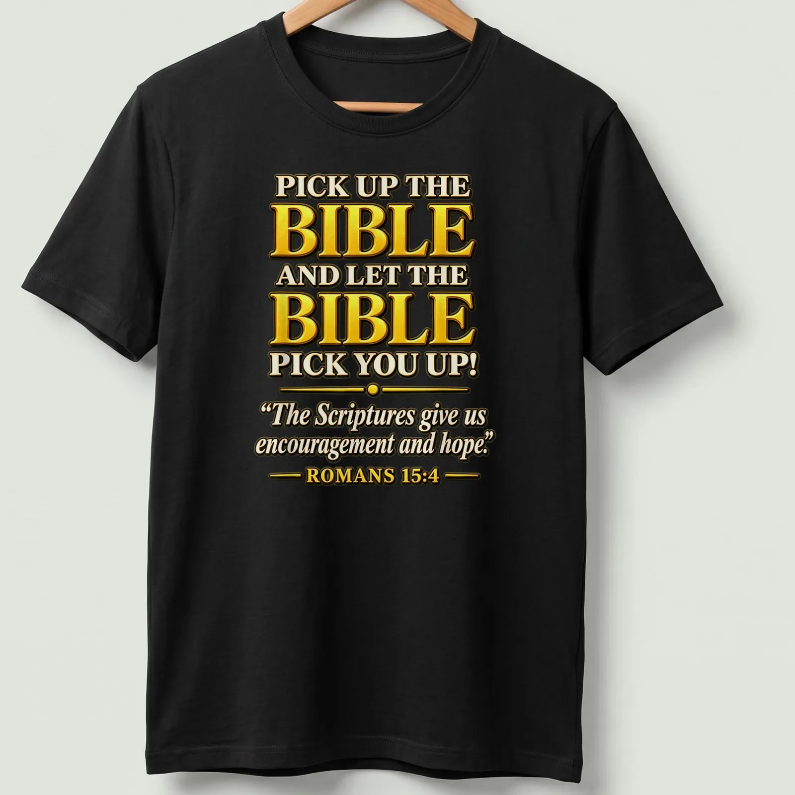 Bold decorative typography featuring Bible verse in gold, black, and white — printed on a unisex t-shirt