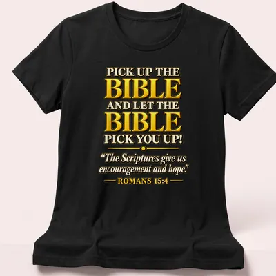 Bold decorative typography featuring Bible verse in gold, black, and white — printed on a women's shirt