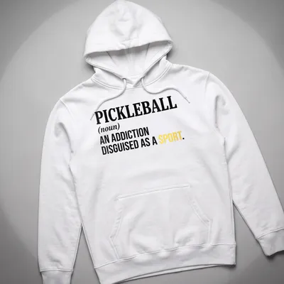 Text-based design featuring the definition of pickleball as an addiction disguised as a sport — printed on a unisex hoodie