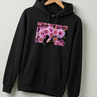 Photographic design of pink chrysanthemum flowers in vibrant colors — printed on a unisex hoodie