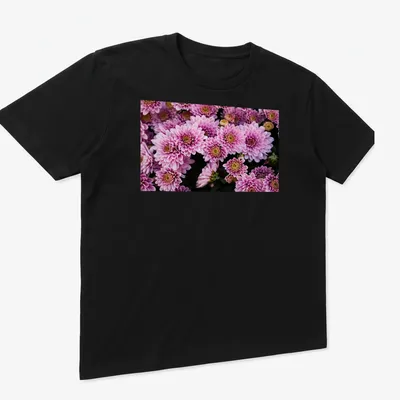 Photographic design of pink chrysanthemum flowers in vibrant colors — printed on a unisex t-shirt (angled view)