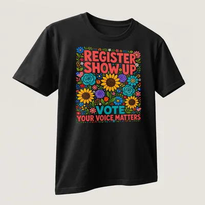 Colorful floral design with text urging civic engagement and voting — printed on a unisex t-shirt (angled view)