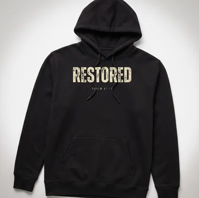Bold distressed Christian shirt featuring the text RESTORED PSALM 51:12. — printed on a unisex hoodie