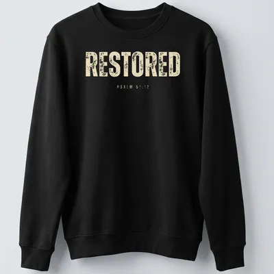 Bold distressed Christian shirt featuring the text RESTORED PSALM 51:12. — printed on a unisex sweatshirt