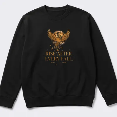 Detailed illustration of a phoenix with the text 'Rise After Every Fall' in gold and orange — printed on a unisex sweatshirt
